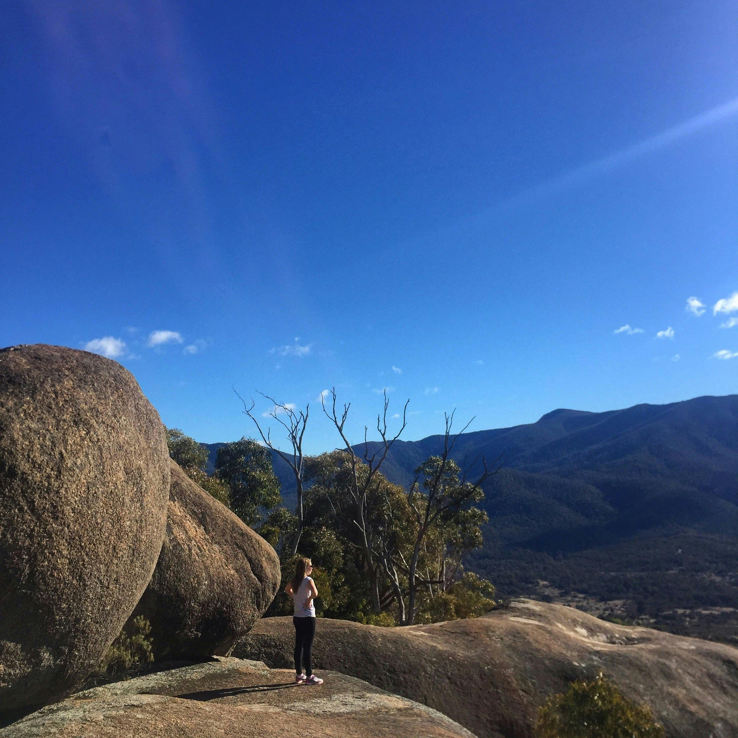 Woman standing at the top of Gibraltar Peak