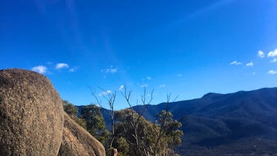 Woman standing at the top of Gibraltar Peak