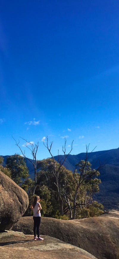 Woman standing at the top of Gibraltar Peak