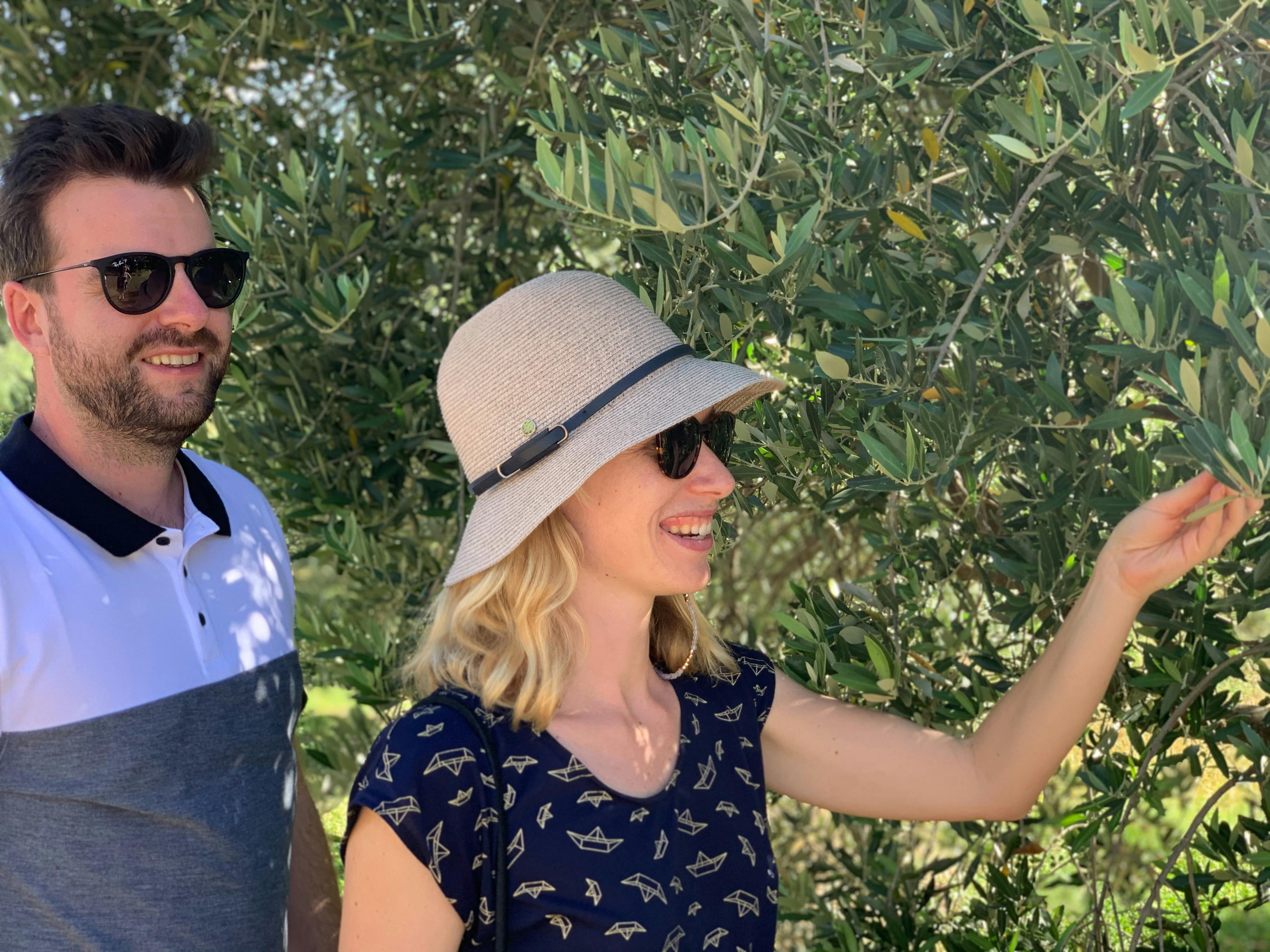 Young couple picking fruit