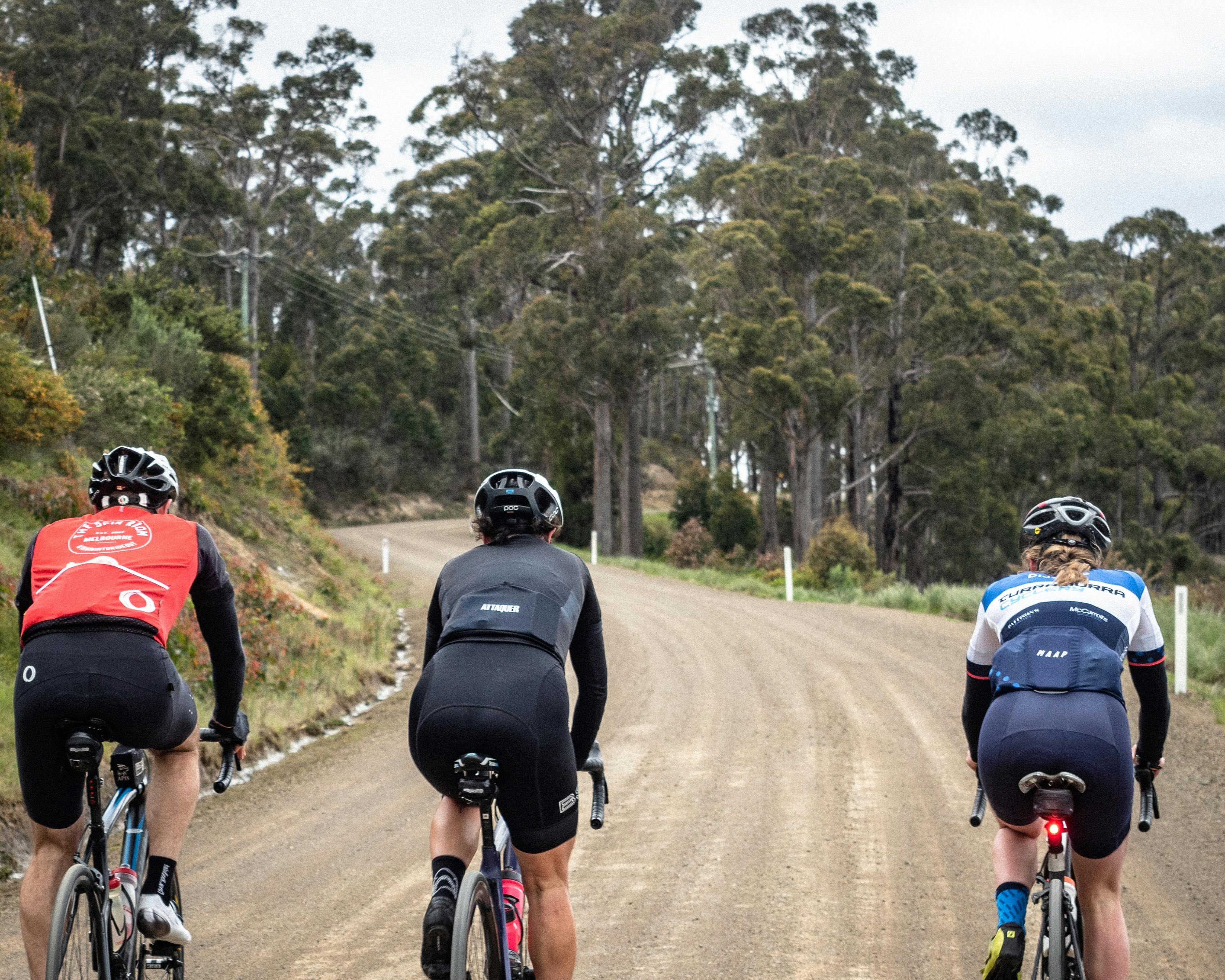 3 cyclists on gravel