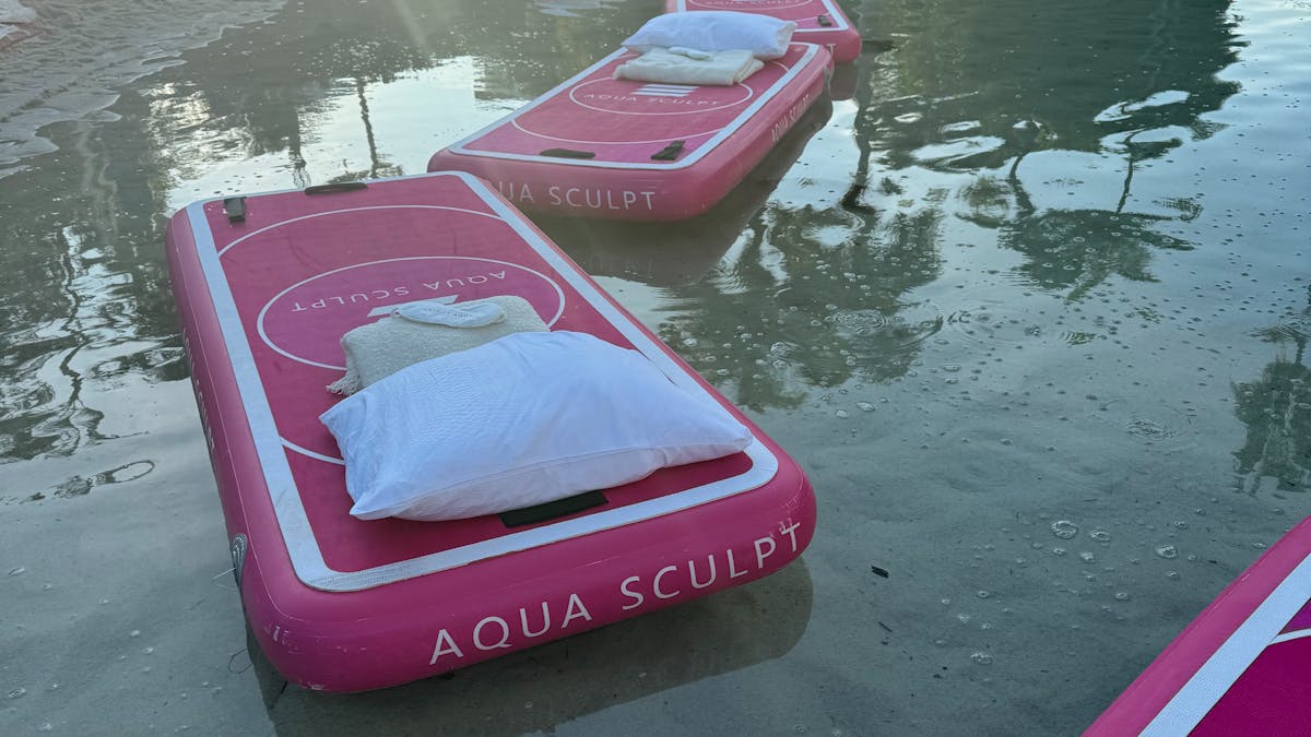 Aqua Sculpt floating boards positioned with eye masks and pillows ready for guests to arrive