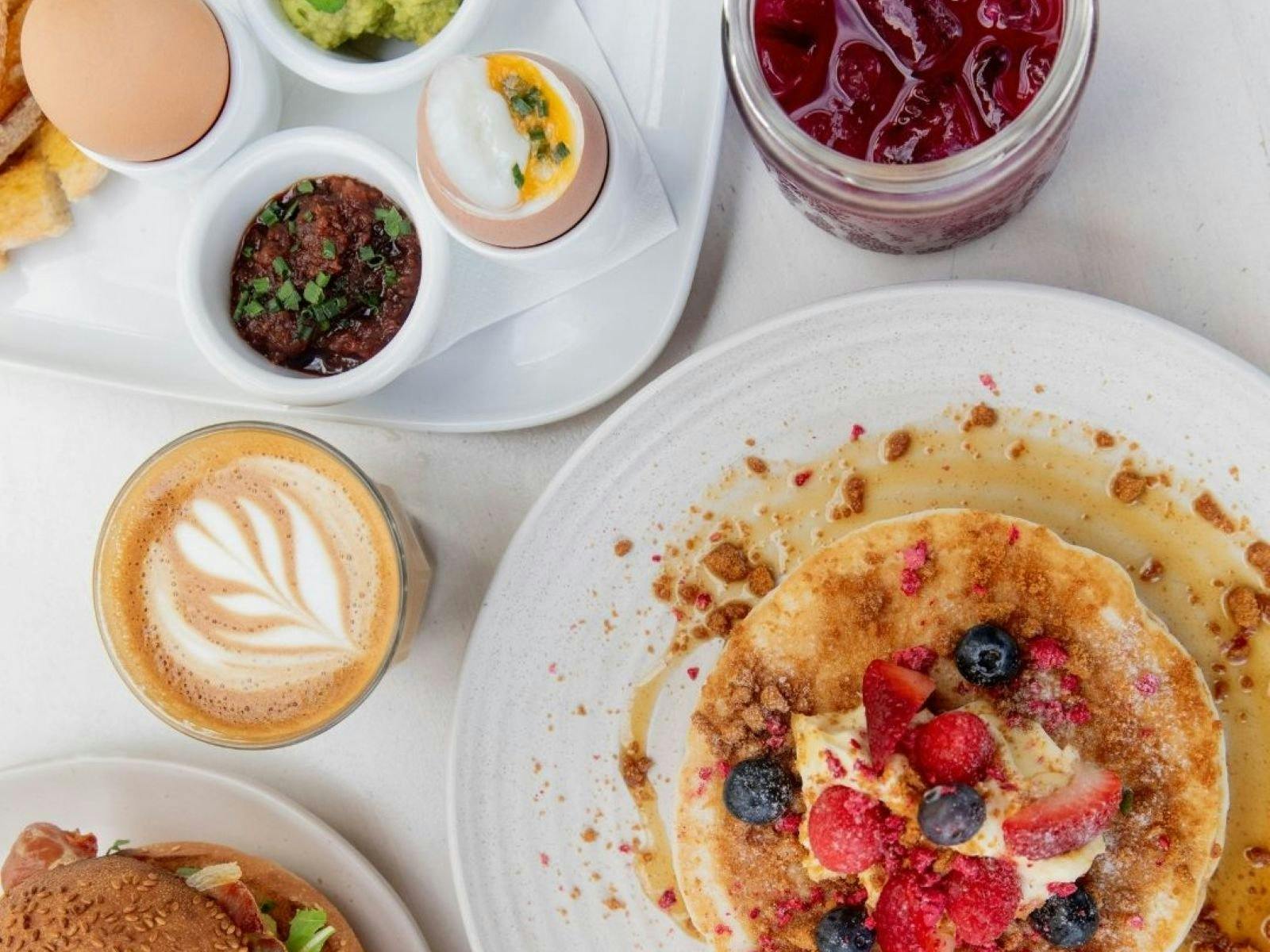 pancakes, coffee, eggs and juice at greencoast