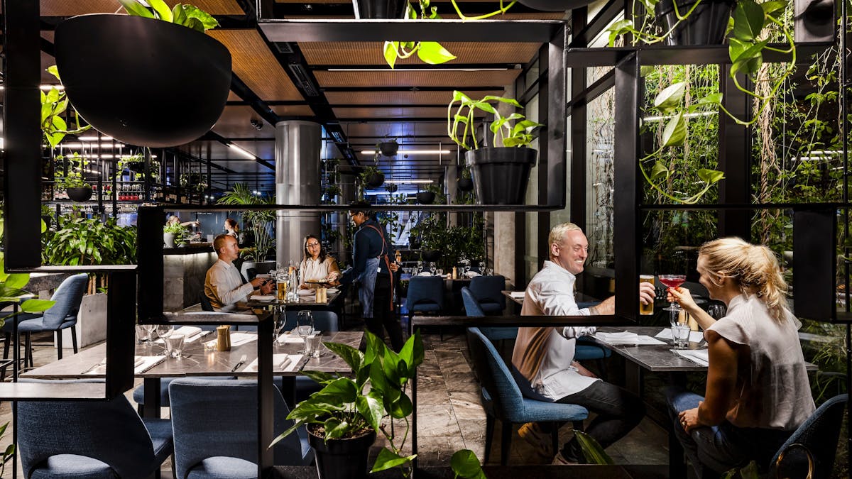 Two couples having dinner at the restaurant
