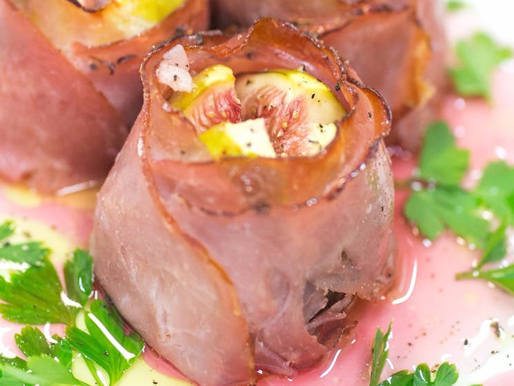 Baked Fig wrapped in proscuitto with Raspberry Finishing Vinegar
