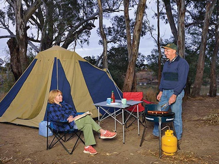 2 people camping at Benarca campgrounds in Murray Valley Regional Park. Photo: Gavin Hansford/NSW