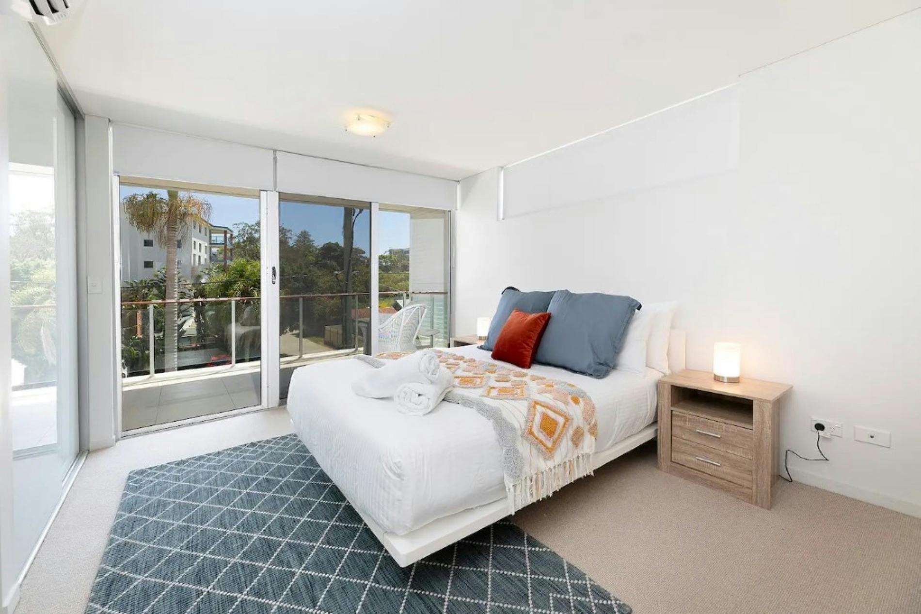 Master bedroom with balcony access