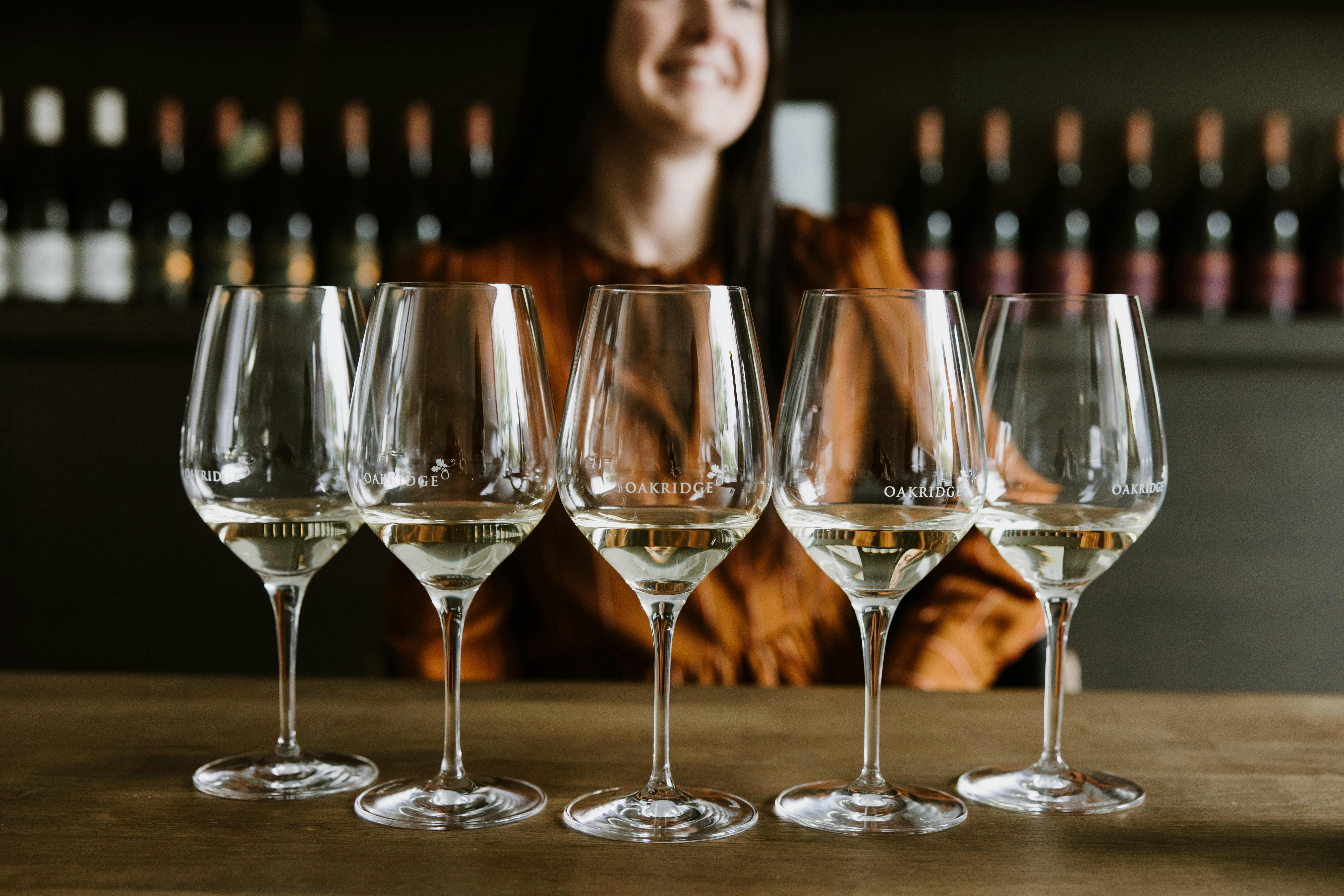 a row of 5 wine glasses with tasting pours of Chardonnay at Oakridge wines