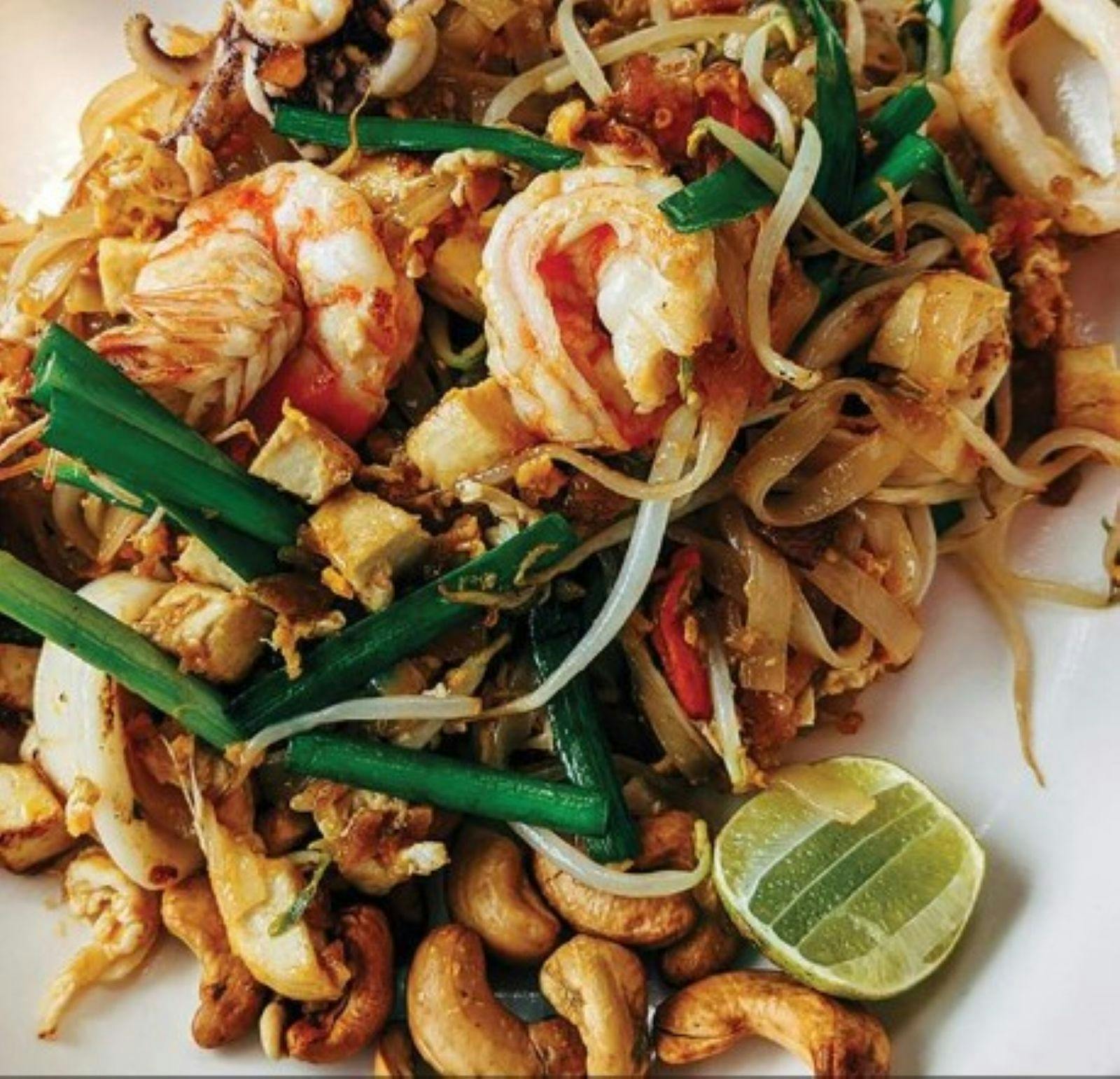 Plate of noodle and prawn stirfry