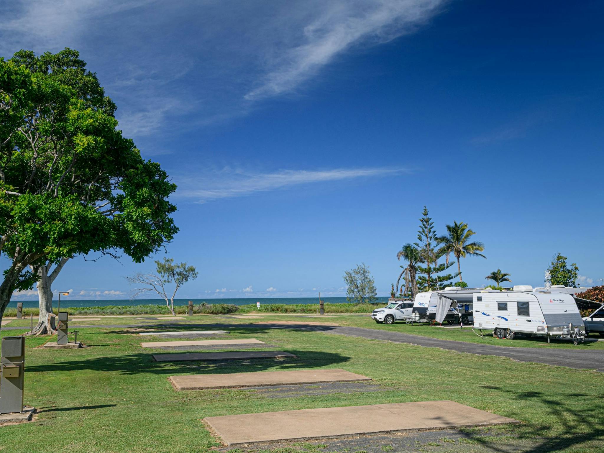 Powered sites with concrete slabs on the beach. Powered sites with concrete slabs on the beach.