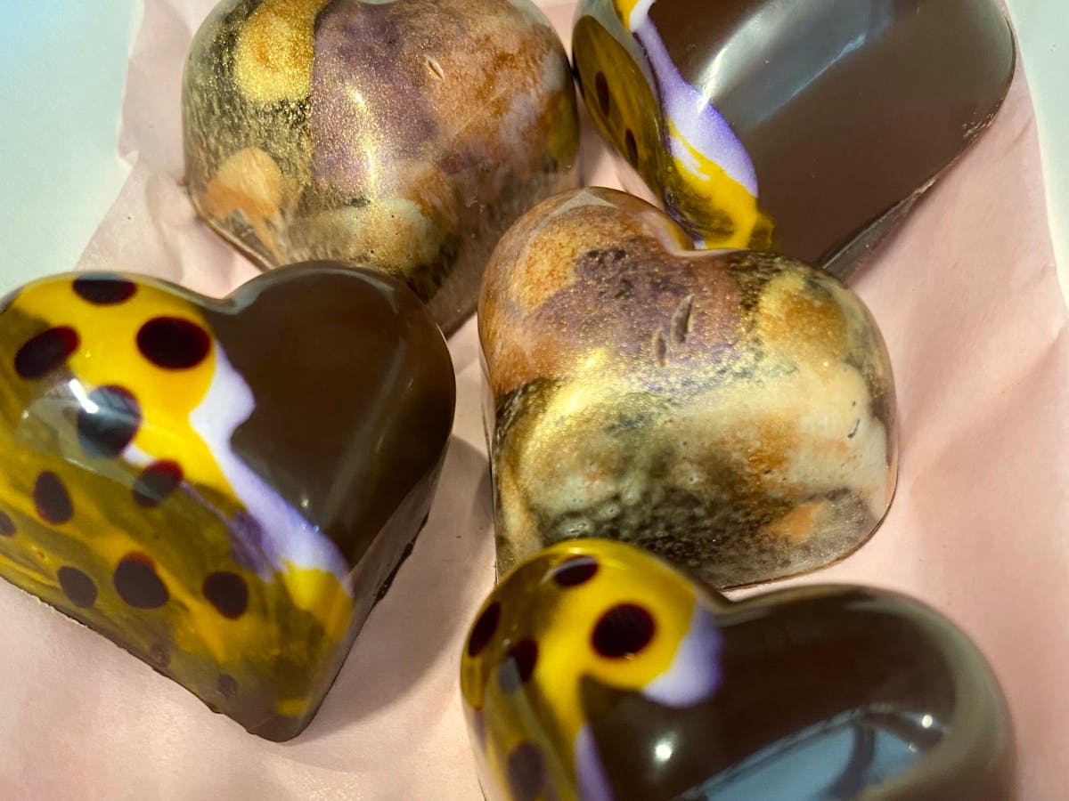 passion hearts made from local passionfruit. couverture chocs made here in our 8th sense kitchen