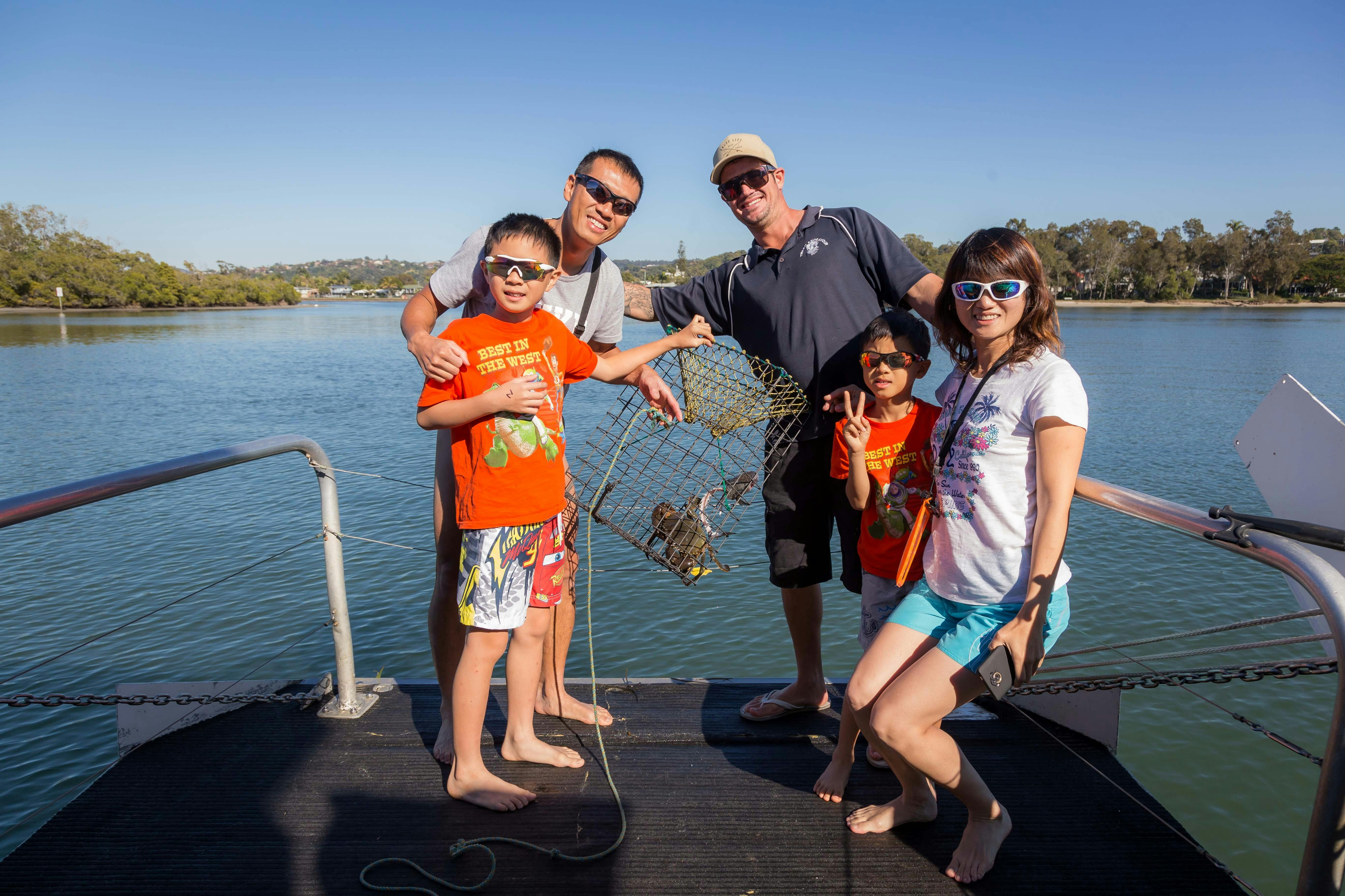 Crab Catching fun with Tweed Eco Cruises fishing tours for the family