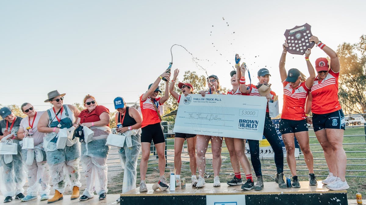 It was tough competition, but the local women's footy team took home the winner's prize money.