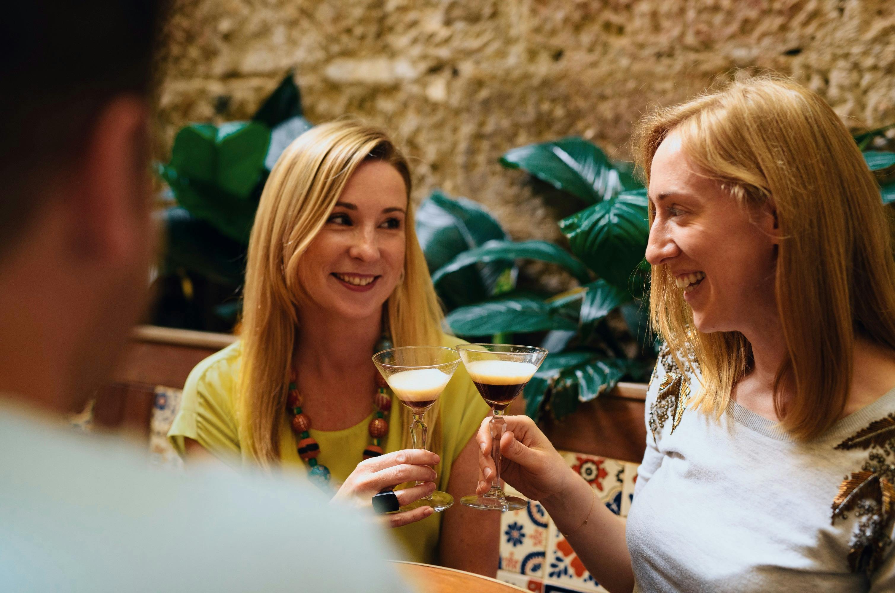 Friends enjoying beverages at The Doss House, The Rocks