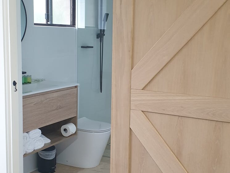 Large bathroom for families with chair accessable showerer