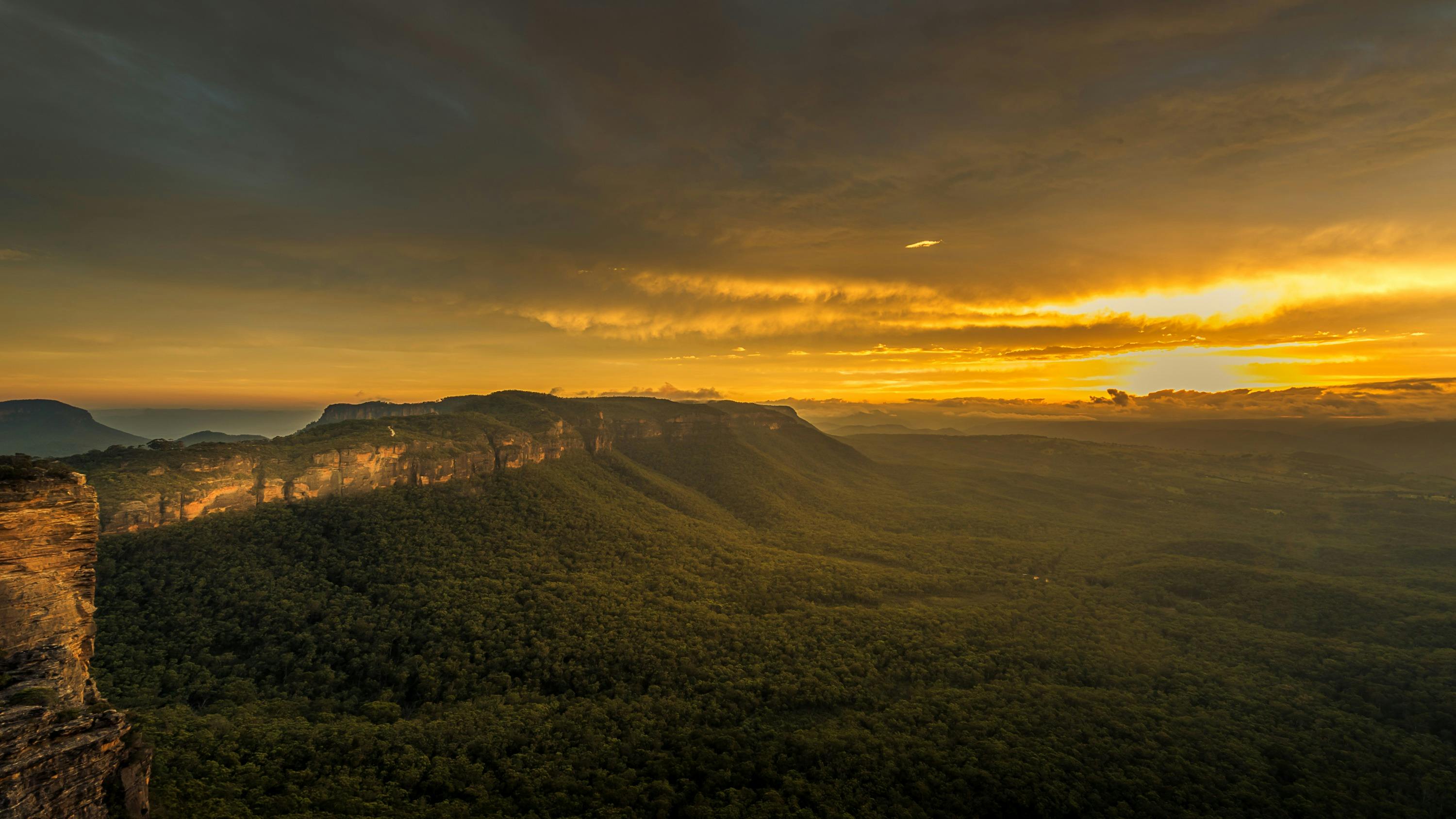 Rich yellow glow of the setting sun across the Megalong Valley