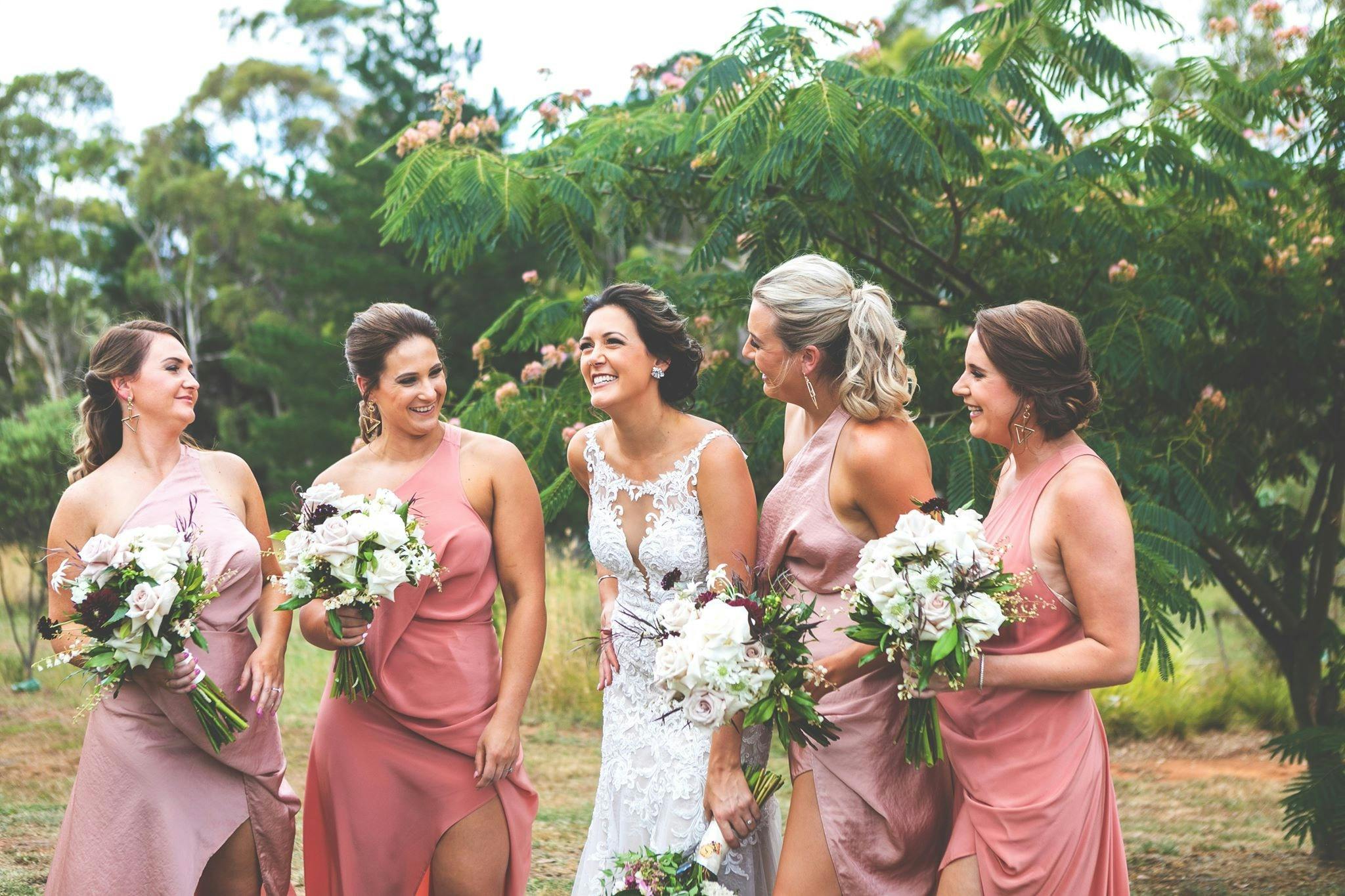 Lakeview Retreat - Bride and bridesmaids having photos on the fron lawn of Emerald Gem Villa