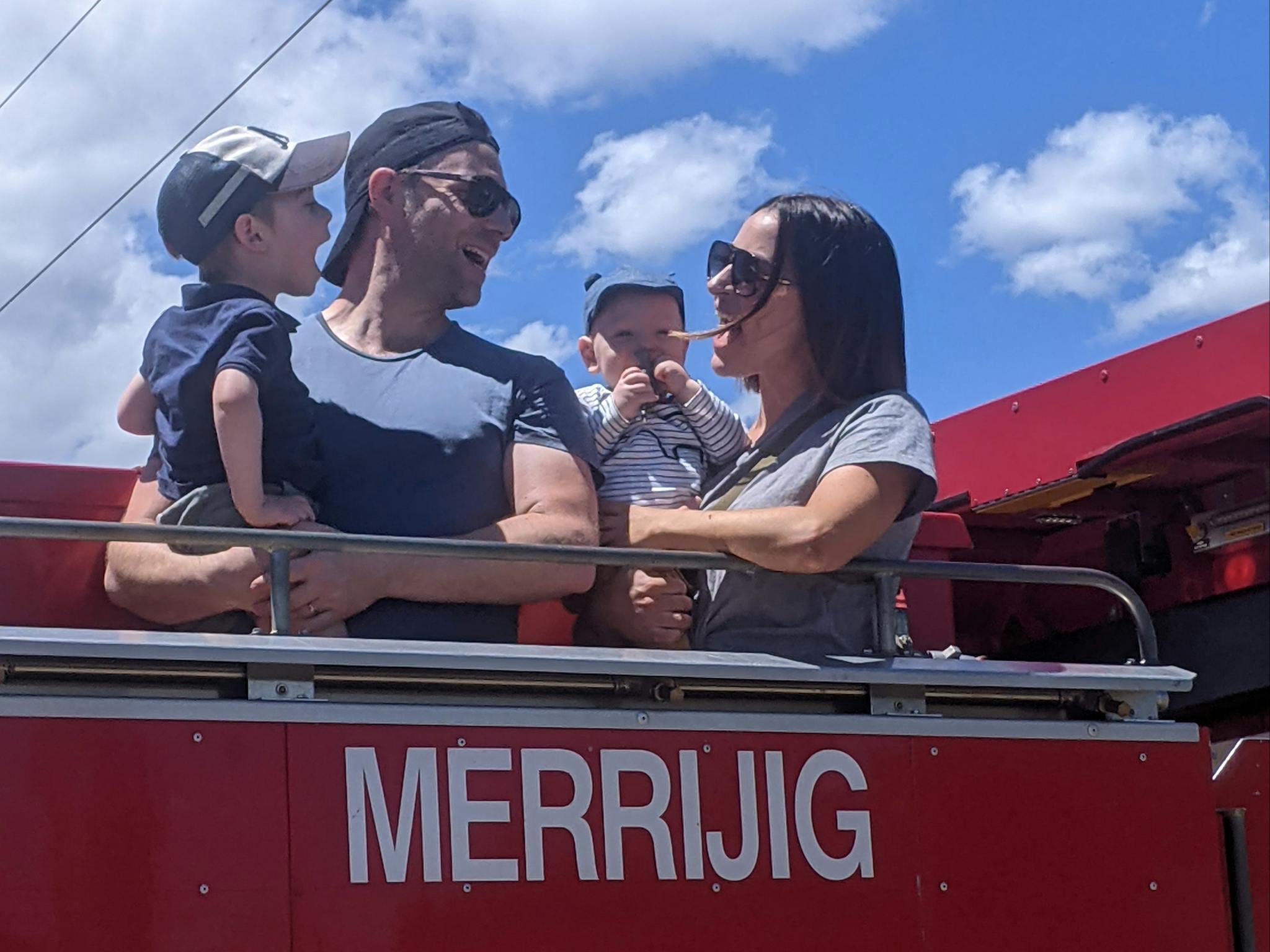 young family on fire tanker