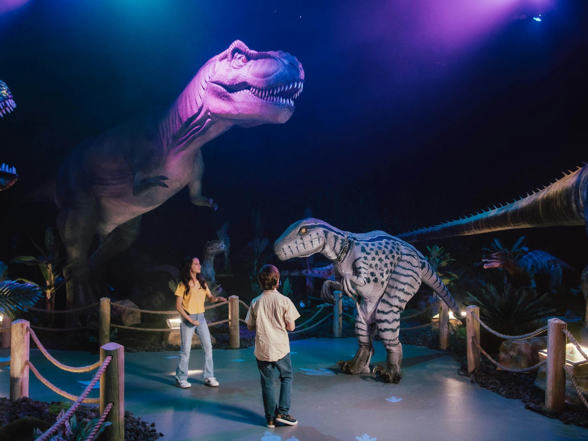 Children interacting with Dino animatronics Children interacting with Dino animatronics