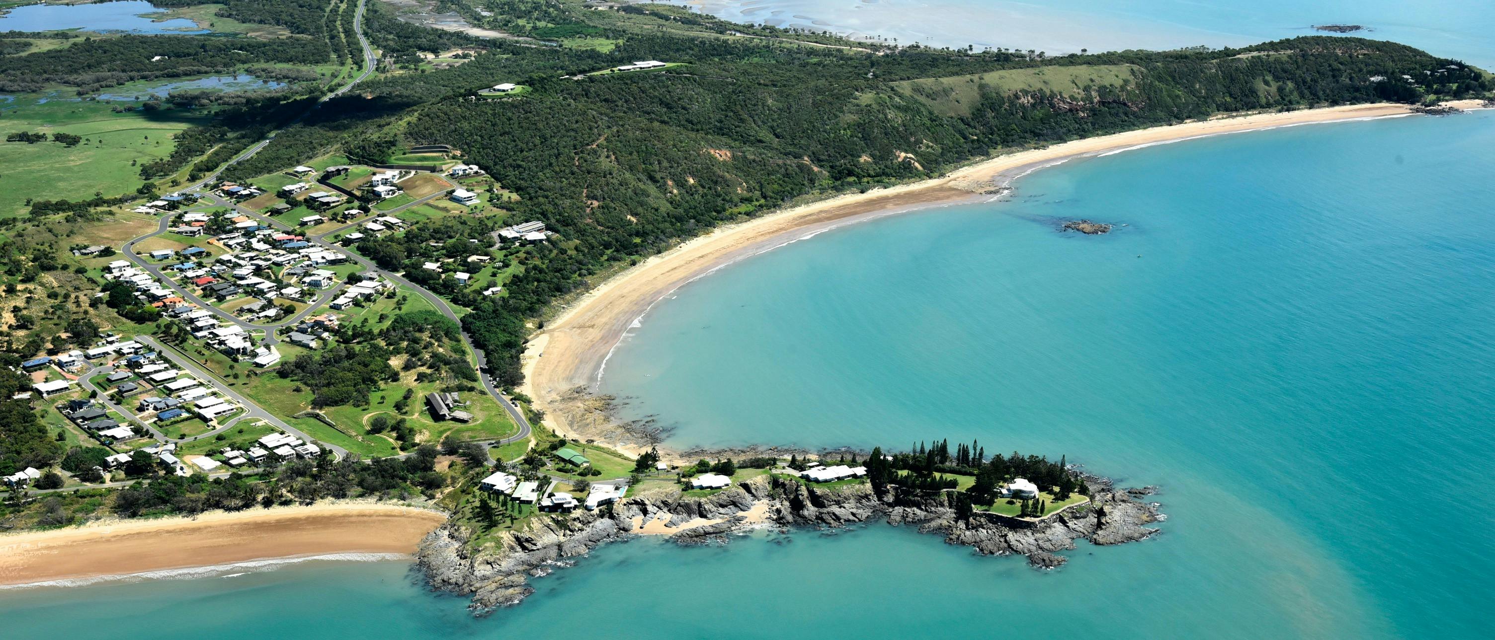 Photo of houses and coastline