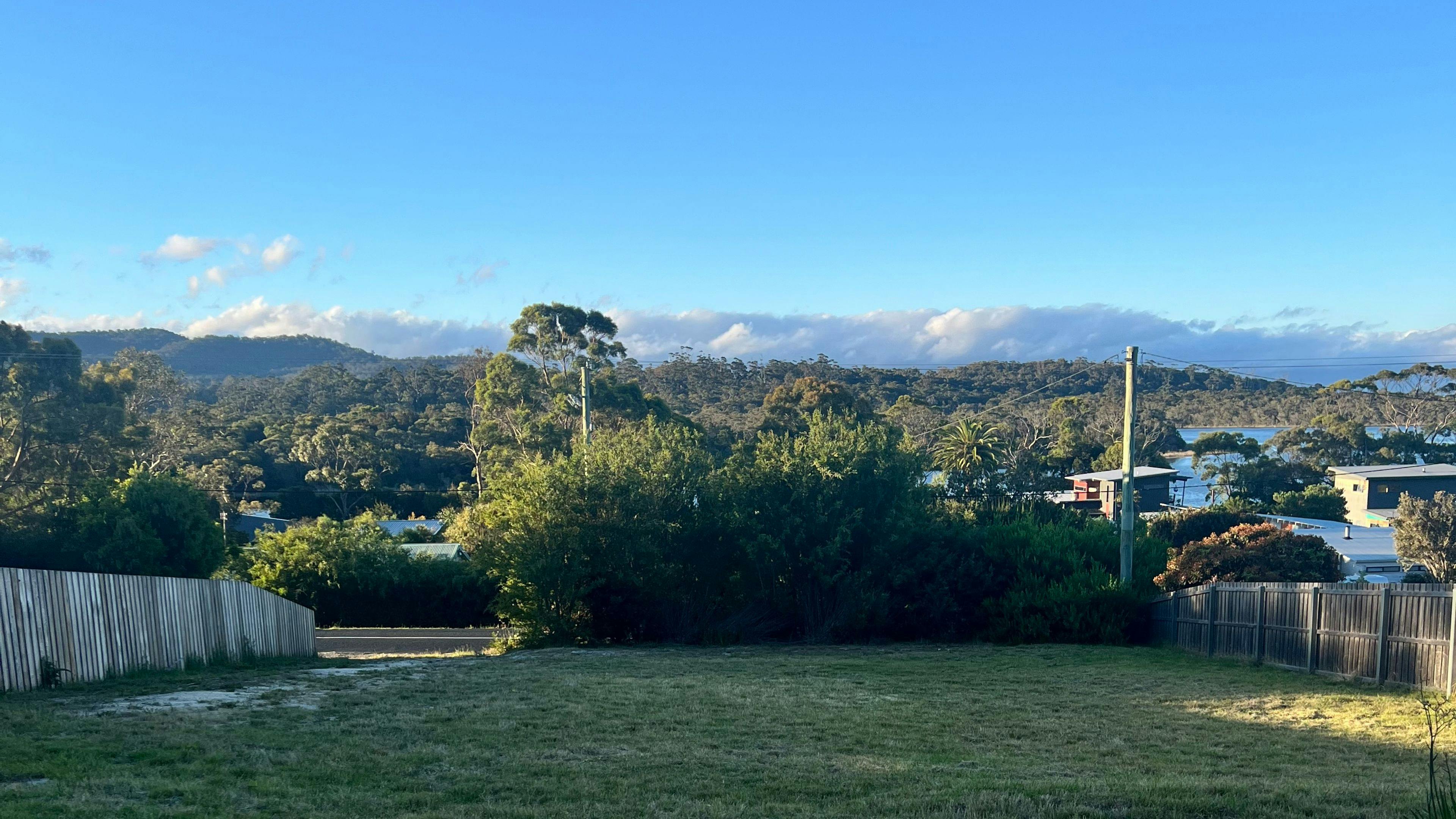 View from the spacious, level camper setup area, perfect for a comfortable stay.