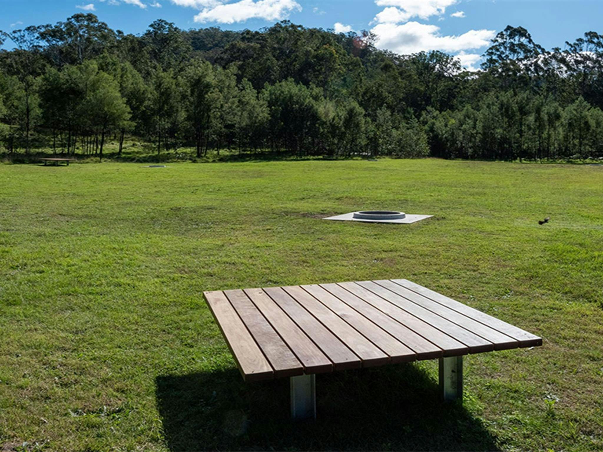 Seating area at Blue Gums campground in Yengo National Park: Credit: Allan Chawner &copy; DCCEEW