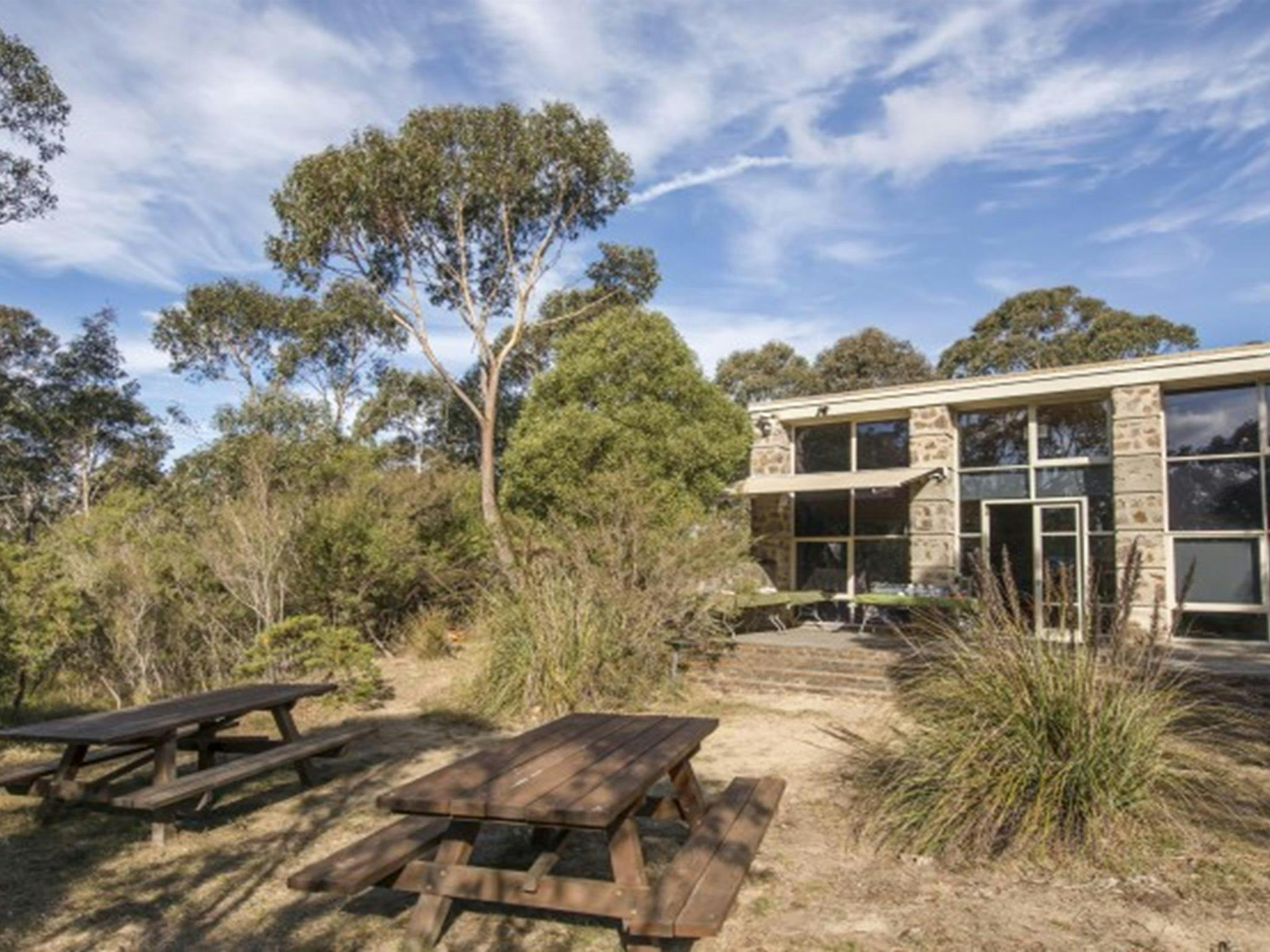 Picnic tables outside Blue Mountains Heritage Centre in Blackheath. Photo: John Spencer &copy; DPIE