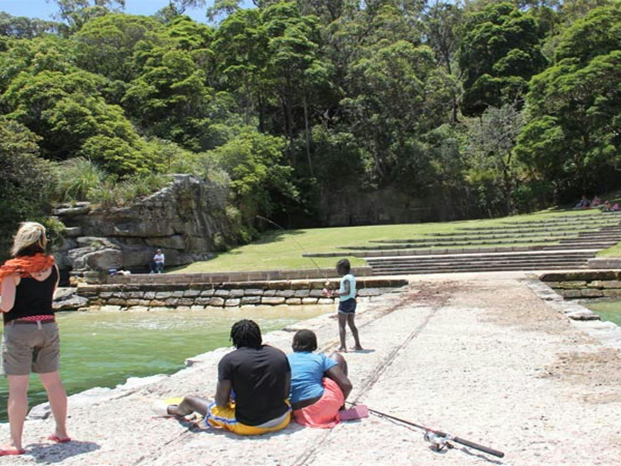 Fishing near Bradleys Head – Booraghee Amphitheatre. Photo credit: John Yurasek &copy; DPIE