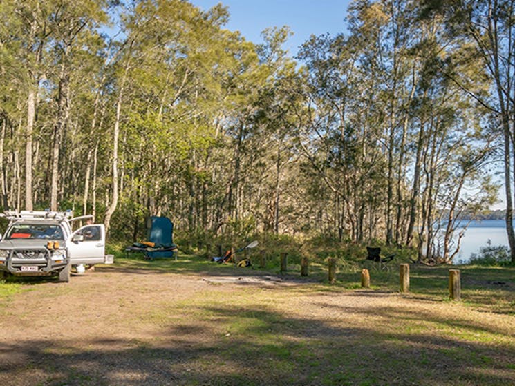 Campers setting up for their stay at Bungarie Bay campground. Photo: John Spencer/OEH
