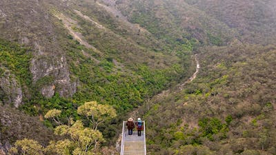 People admiring the views from The Lookdown lookout in Bungonia National Park. Photo: John