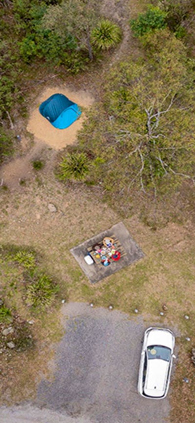 Aerial view of campsites and car spaces at Bungonia campground. Photo: John Spencer/DCCEEW ©