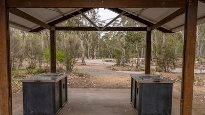 The barbecue facilities under shelter at Bungonia campground. Photo: John Spencer/DCCEEW ©