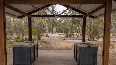 The barbecue facilities under shelter at Bungonia campground. Photo: John Spencer/DCCEEW ©