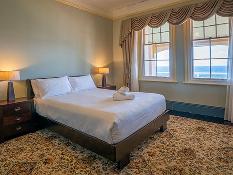 Double bedroom with water views in the Assistant Lighthouse Keepers Cottage. John Spencer/DPIE