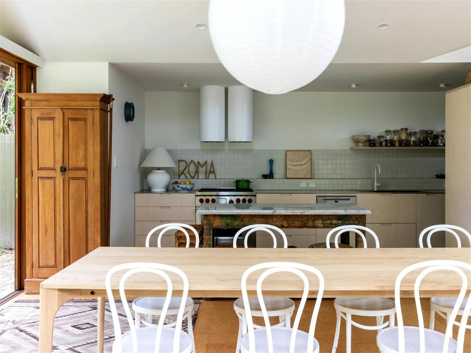 The back of the house is all about the kitchen, living, dining, and of course the garden