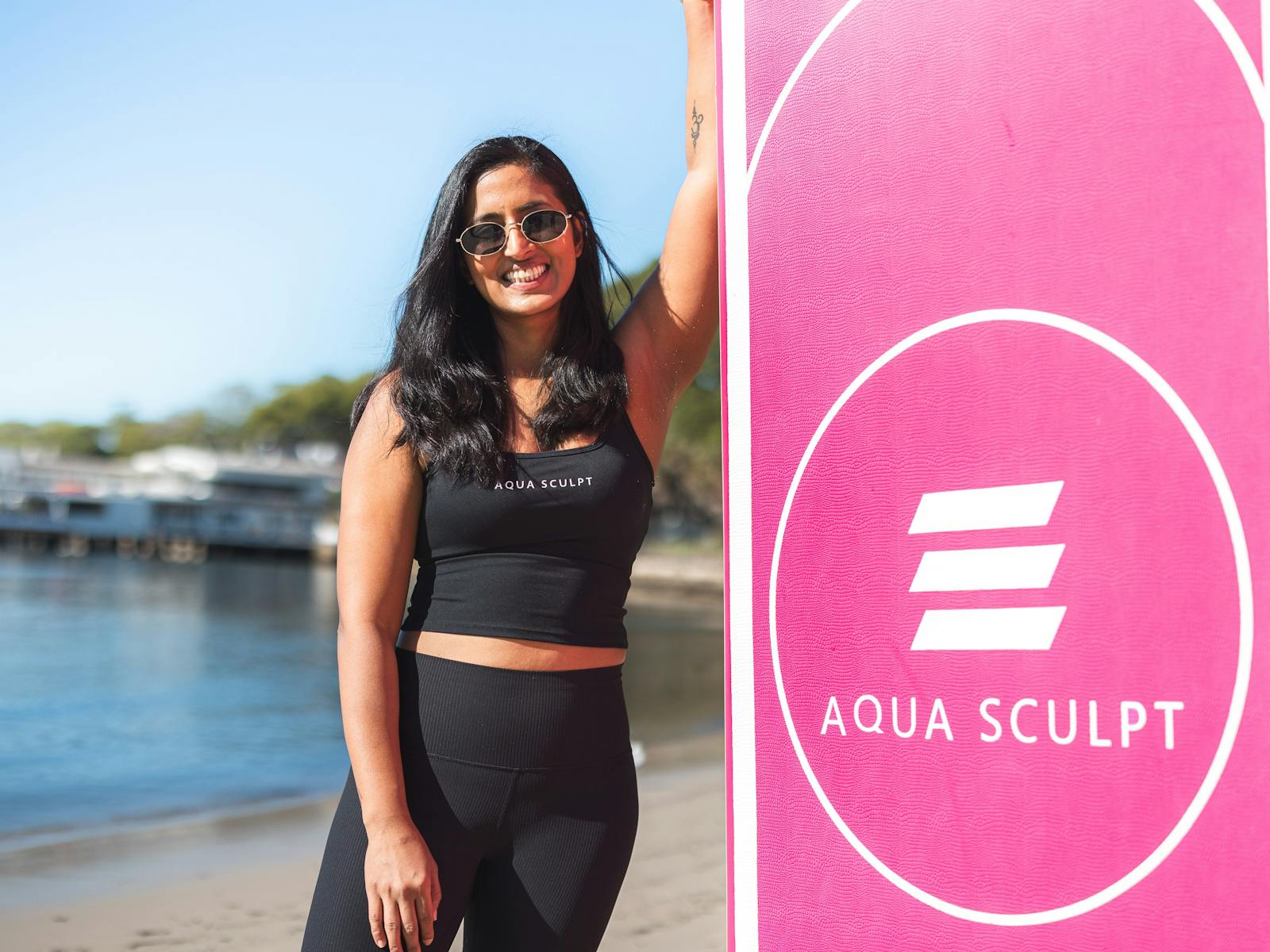 Instructor holding an Aqua Sculpt board