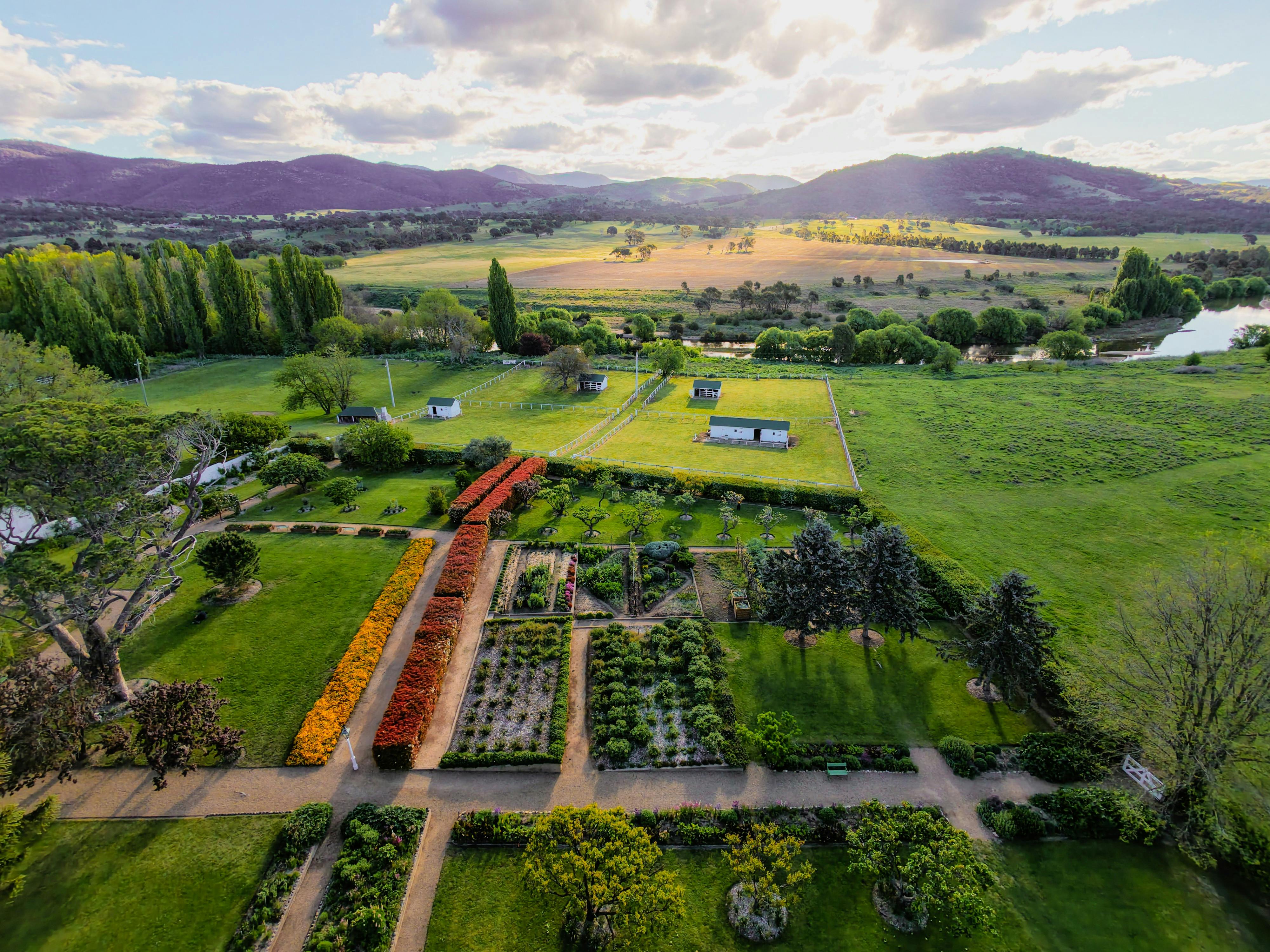 Drone image of Lanyon Homestead towards murrimbidgee river and brindabellas