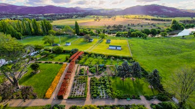 Drone image of Lanyon Homestead towards murrimbidgee river and brindabellas
