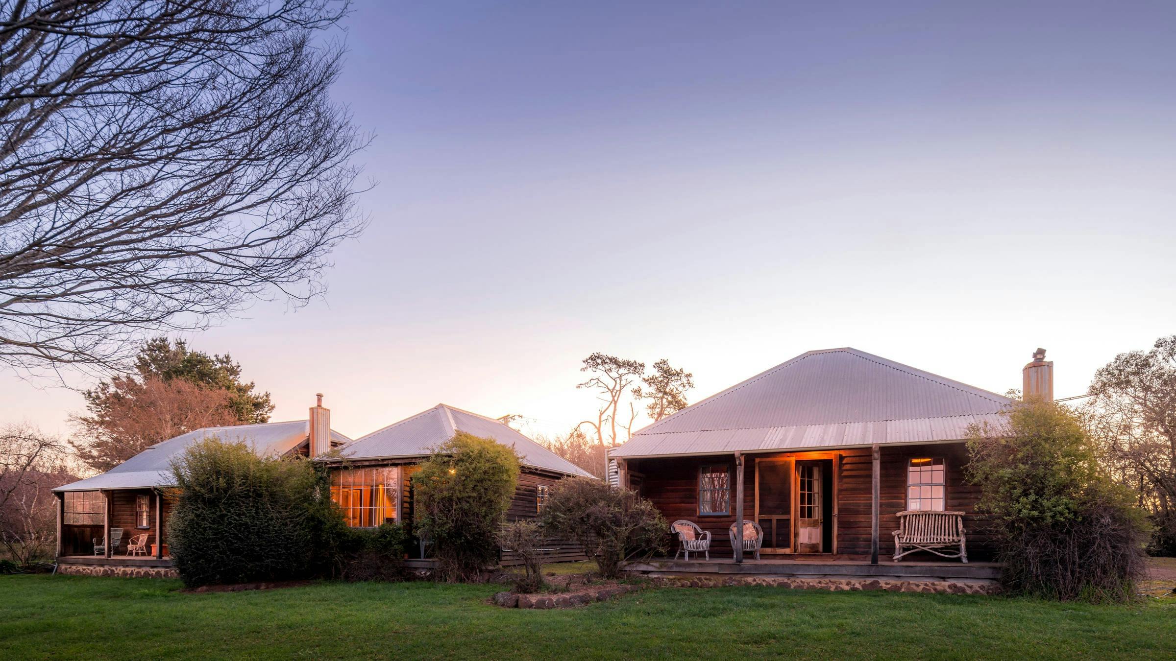 3 farm cottages in a row at sunset