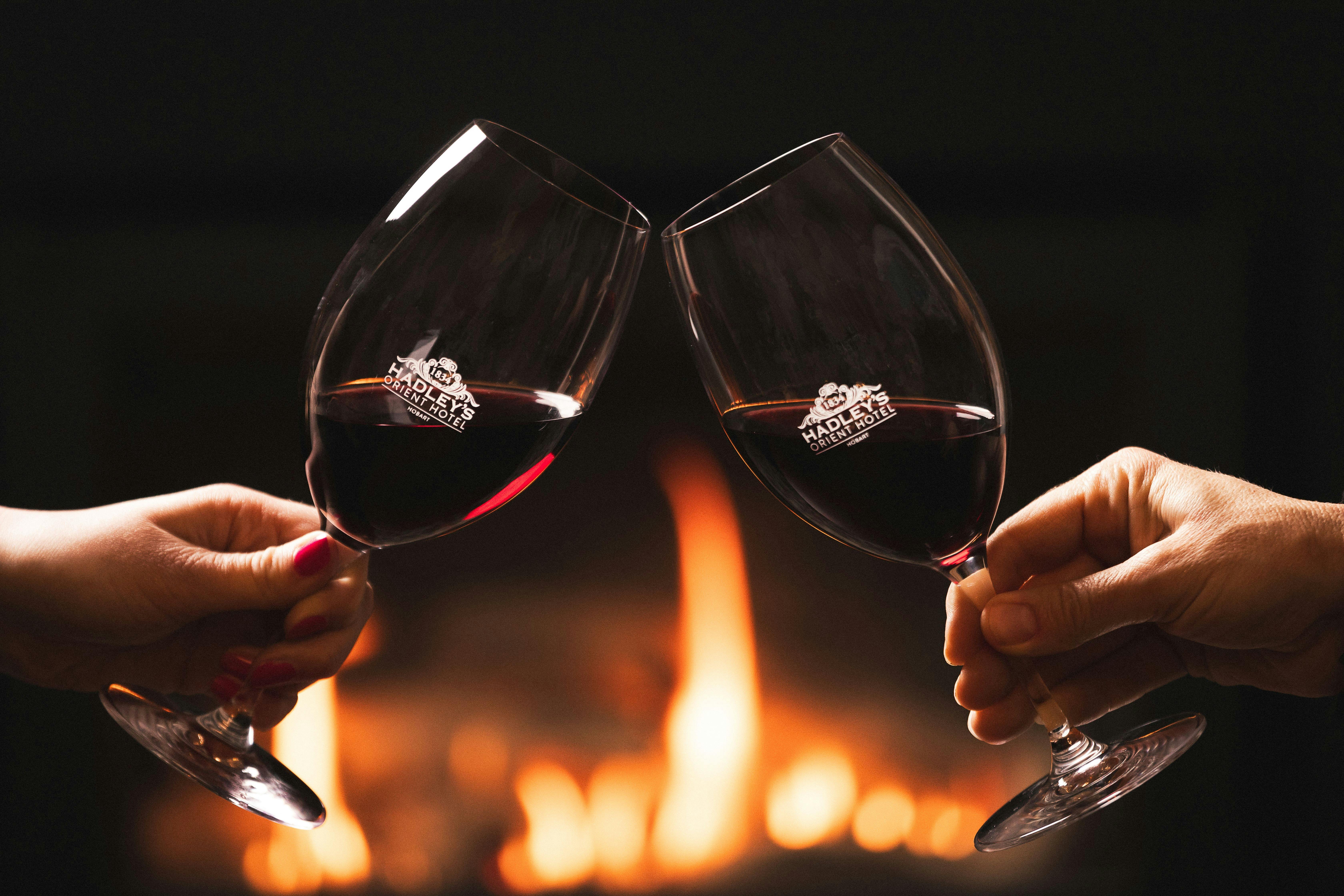 Wine by the fire in the Orient Bar