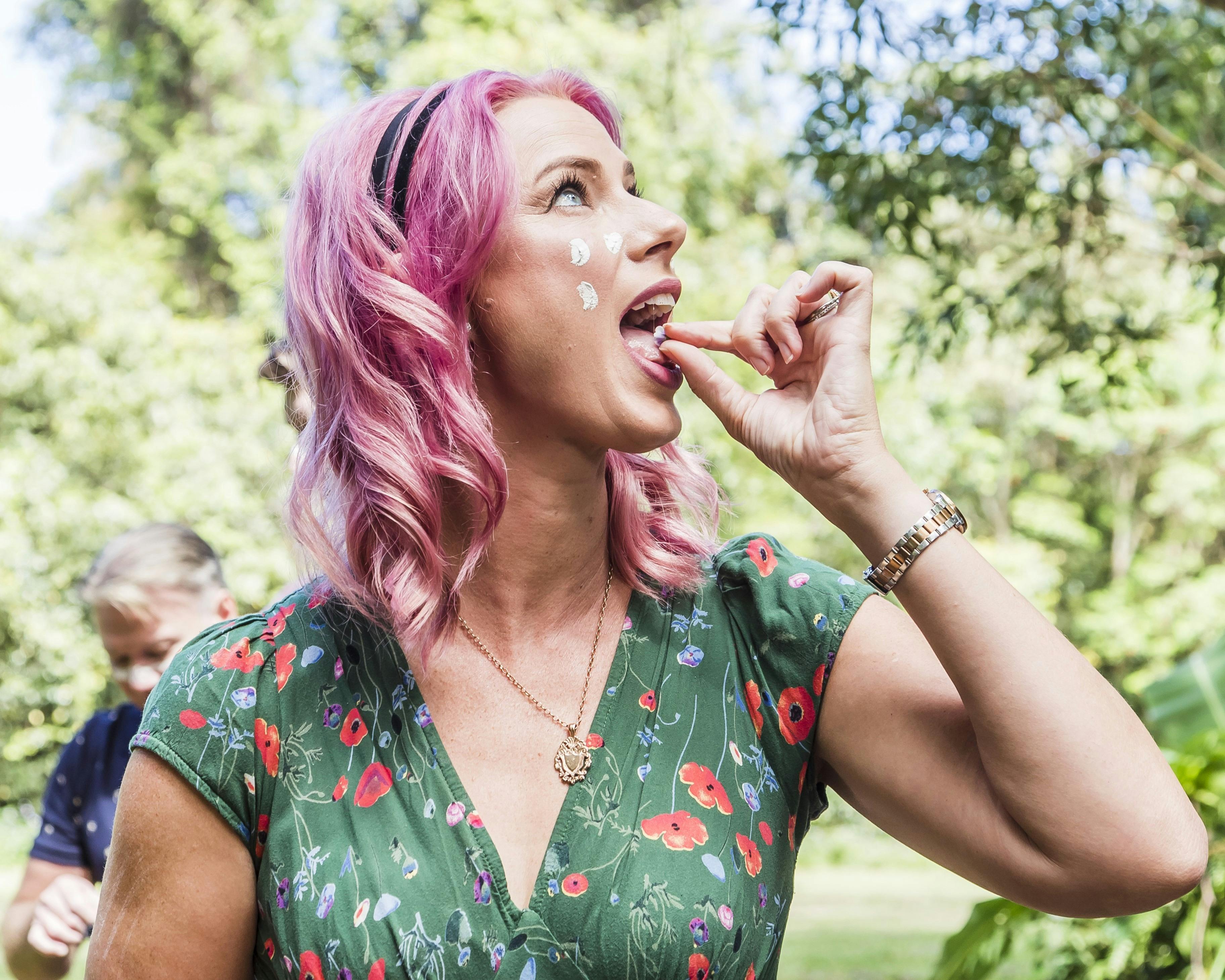 A guest enjoys bushtucker on a nature walk