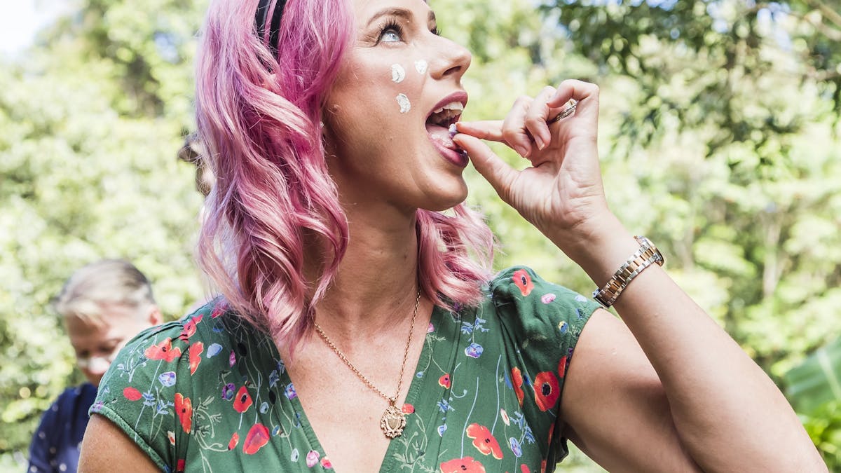 A guest enjoys bushtucker on a nature walk