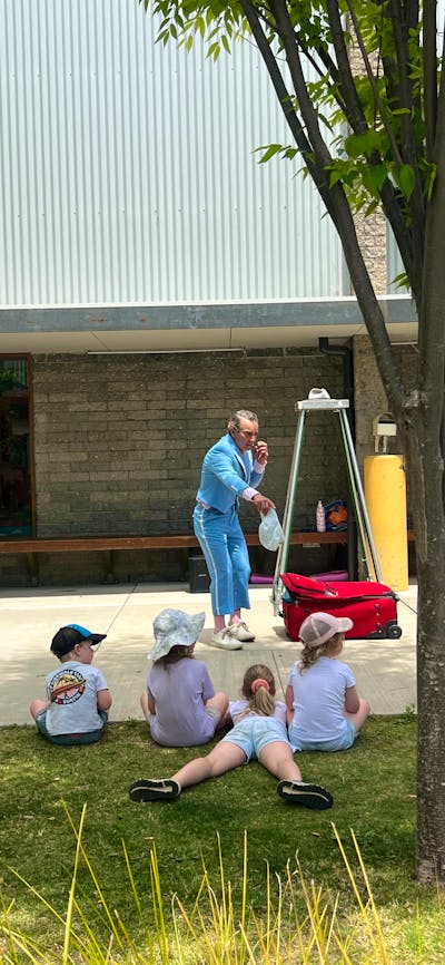 street performer entertaining children