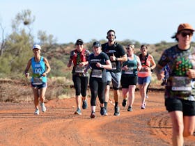photo of runners in a group on outback road in Kanku-Breakaways