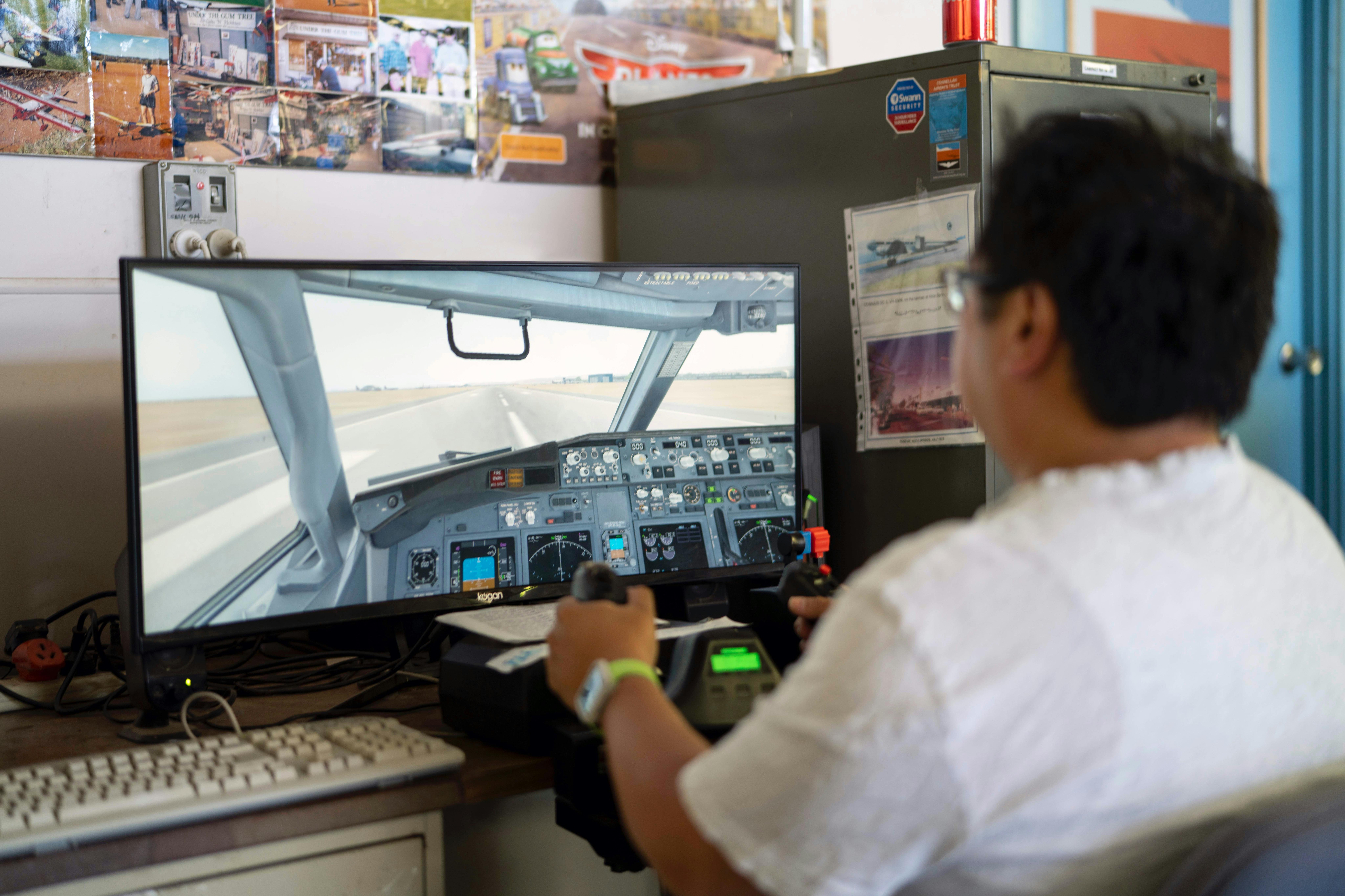 Try your hand on the Flight Simulator - volunteers are there to help.