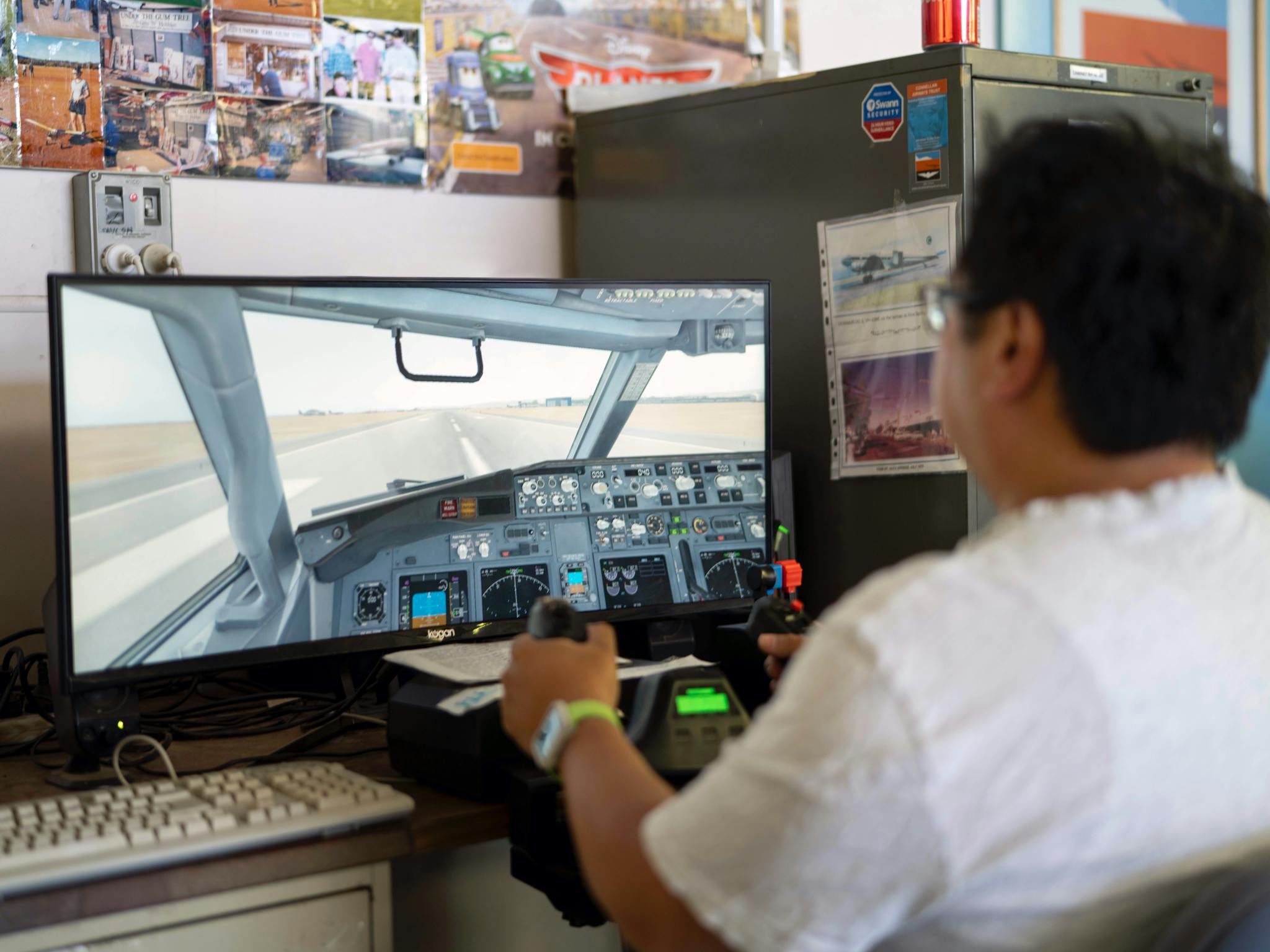 Try your hand on the Flight Simulator - volunteers are there to help.