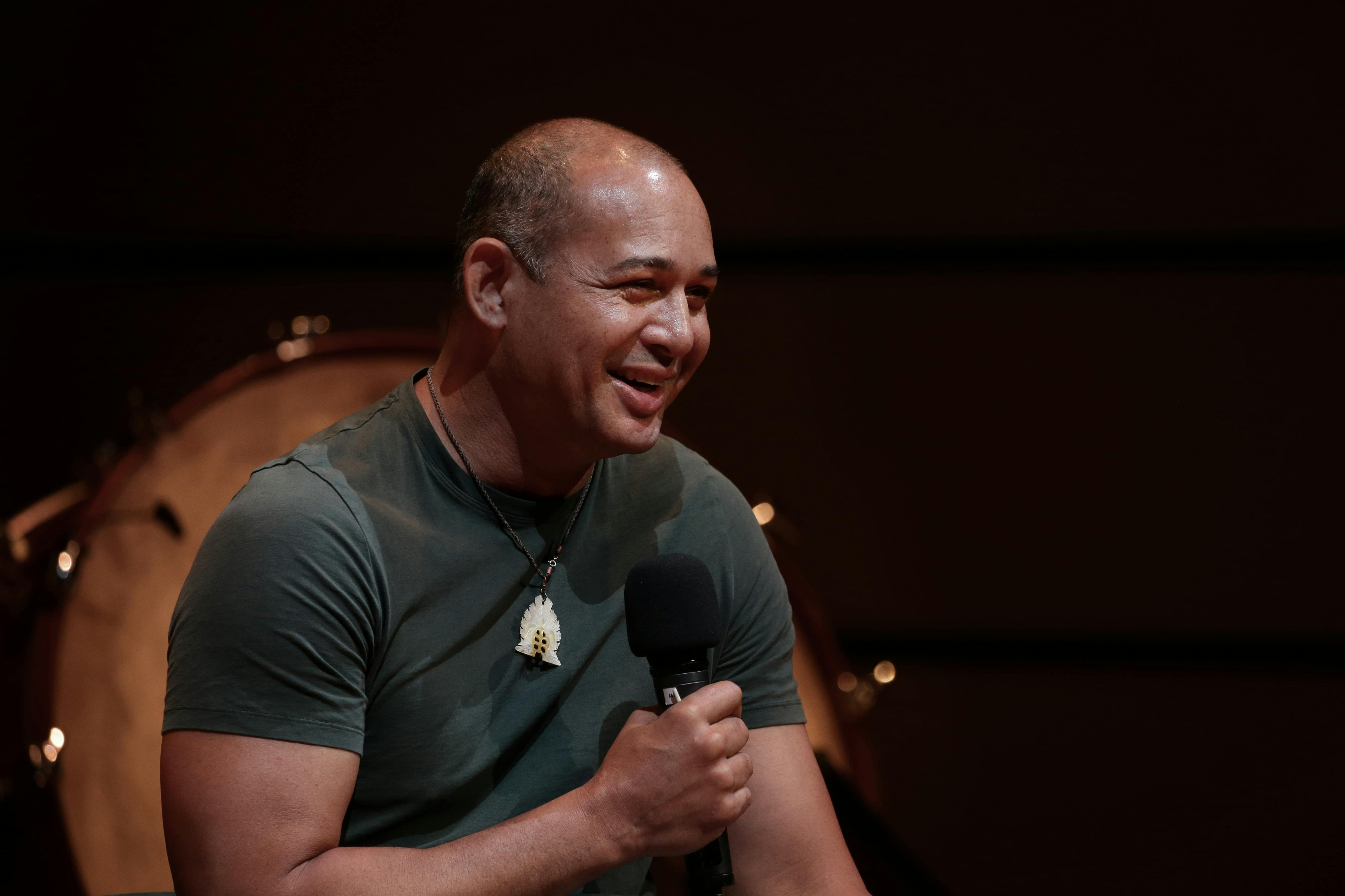 Thomas Mayo smiles at the audience