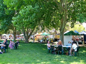 Photograph of families and people out enjoying a day out at the Growers Market