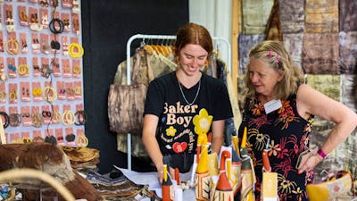 Buyers looking at artwork