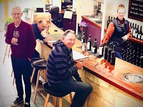 Golf group enjoying a day of wine tasting